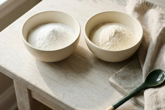 Two ceramic bowls of collagen powder side by side